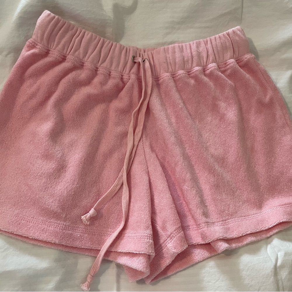 Women’s short Terry shorts with “South Beach” in silver stones.